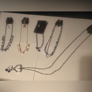 Set of 5 Paparazzi necklace and earring sets.